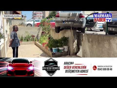 El freni çekilmeyen otomobil duvarda asılı kaldı